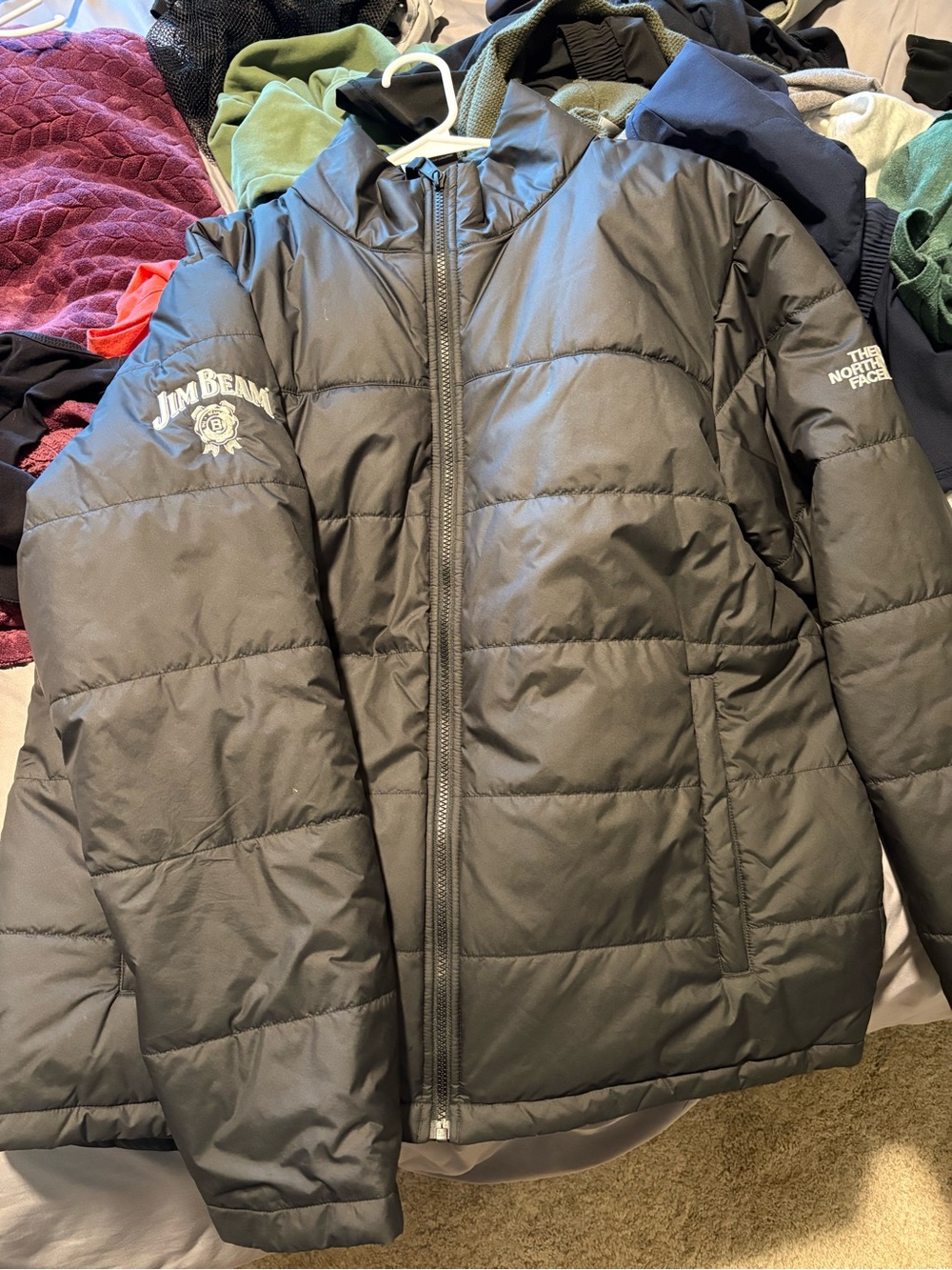 The North Face Black Puffer Jacket with White Logo Embroidery